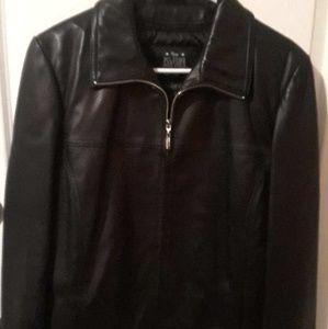 Black leather jacket. Never weared